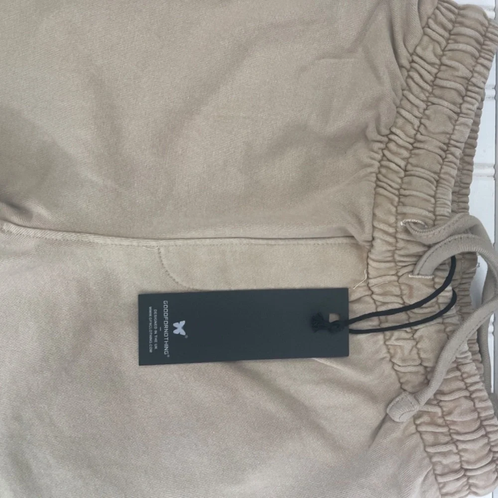 NWT Good For Nothing acid wash jersey shorts in beige with logo print Small